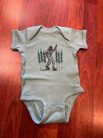 Infant- Bigfoot giving a Peace Sign